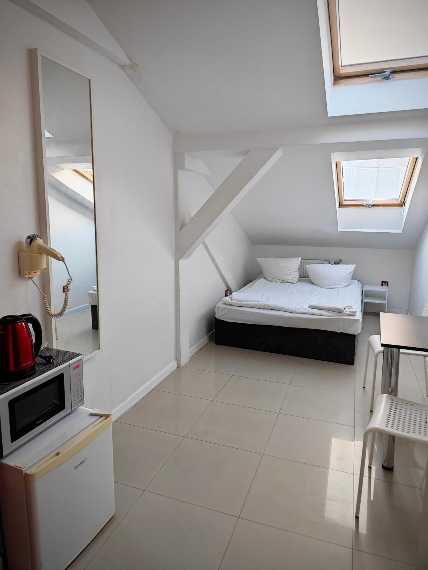 Apartamenty Hoza Attic Studio Varsóvia Quarto foto