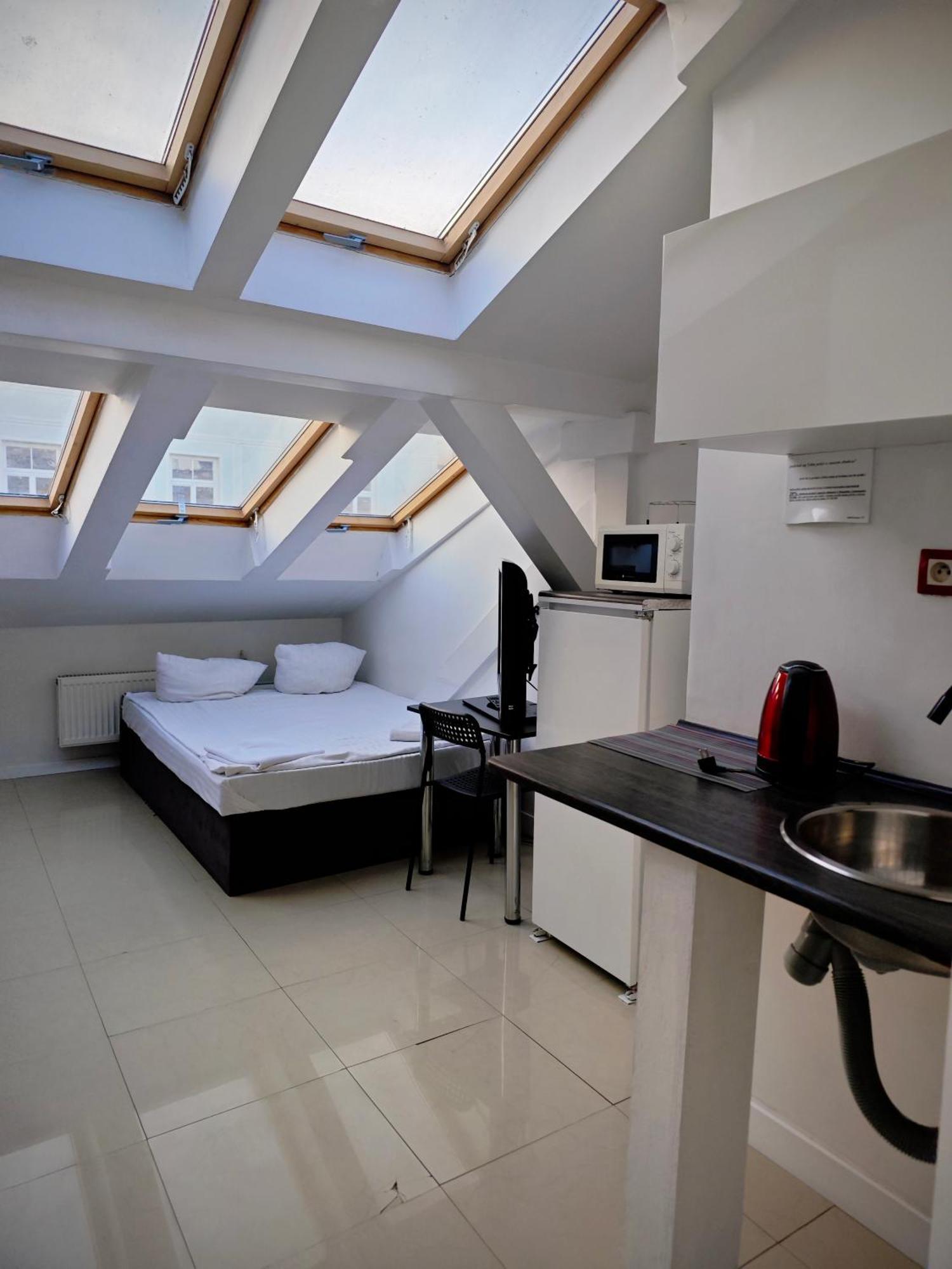 Apartamenty Hoza Attic Studio Varsóvia Quarto foto